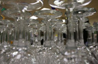 closeup of a collection of drinkng glasses on a table